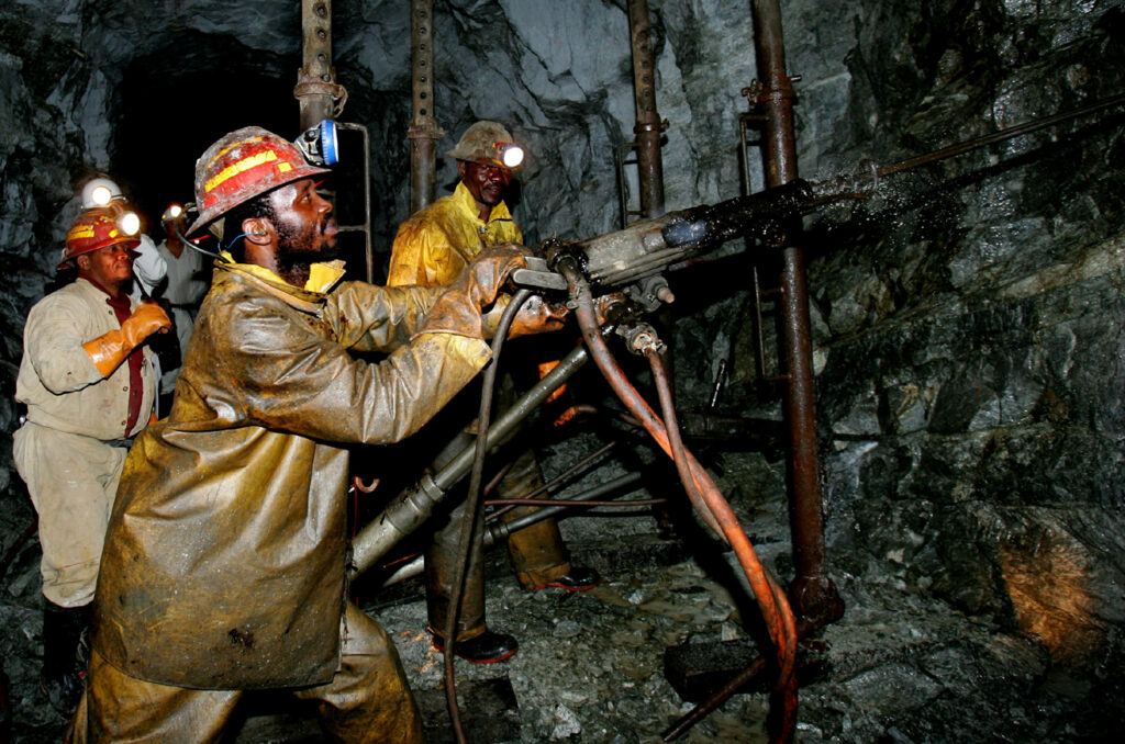 Mineworkers Work Deep Underground At Harmony Gold Mines Cooke Shaft Near Johannesburg